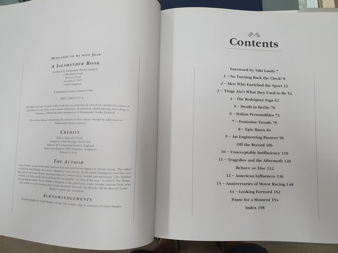 Hardcover history book open to the contents and credits pages
