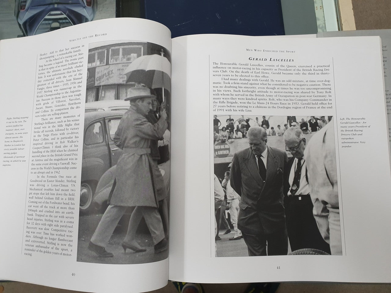 Hardcover book open to chapter pages with two black-and-white portrait photos