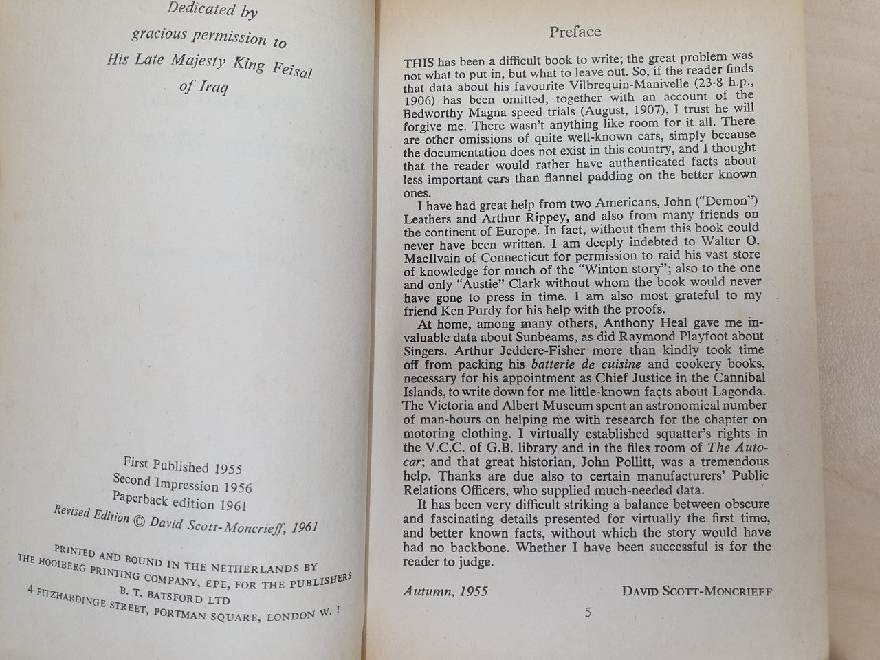 Paperback book open to printed text pages with preface and author notes.