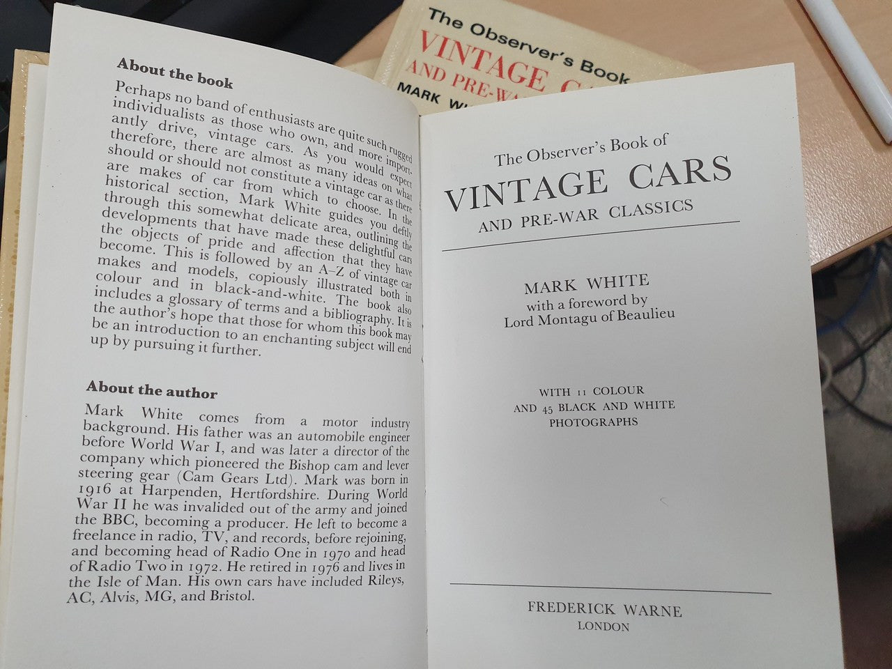 Vintage car and pre-war classics book, open to title and author pages.