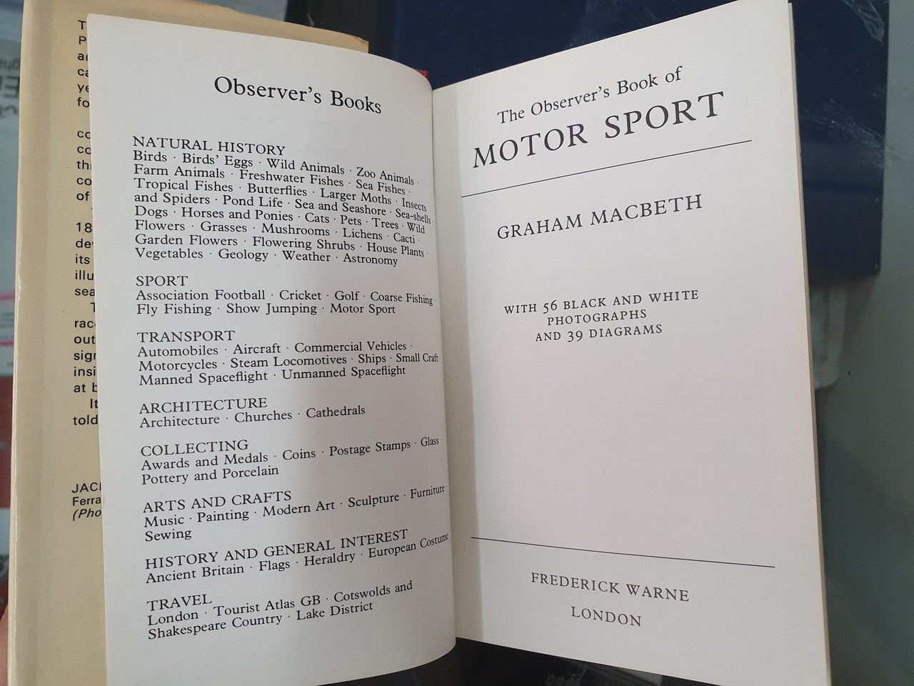Motor sport book open spread showing categories list and page header with title