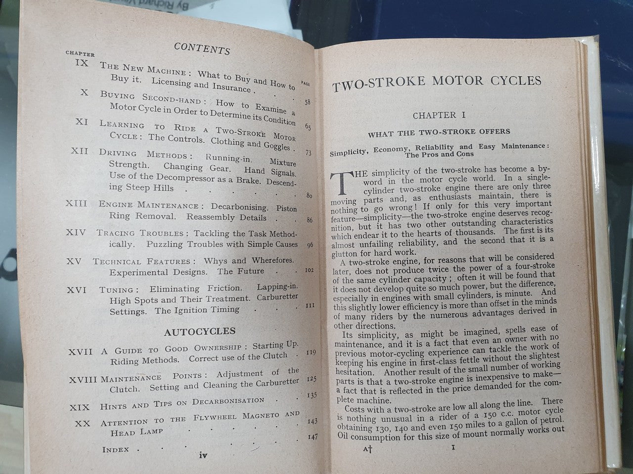 Open hardcover book showing contents pages with chapter headings