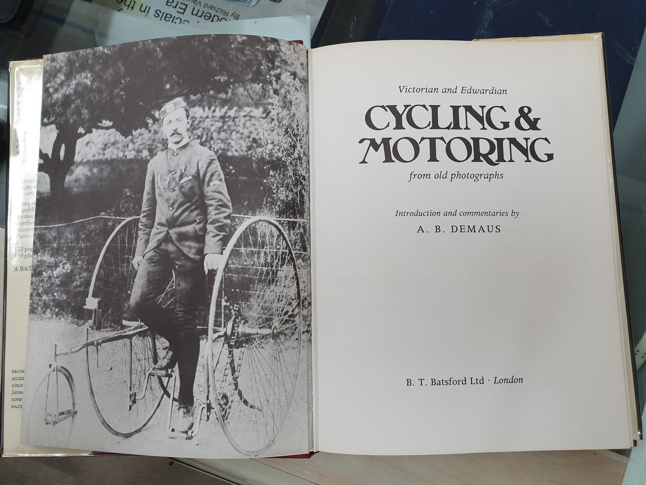 Open book with cyclist portrait on left and “Cycling & Motoring” title on right