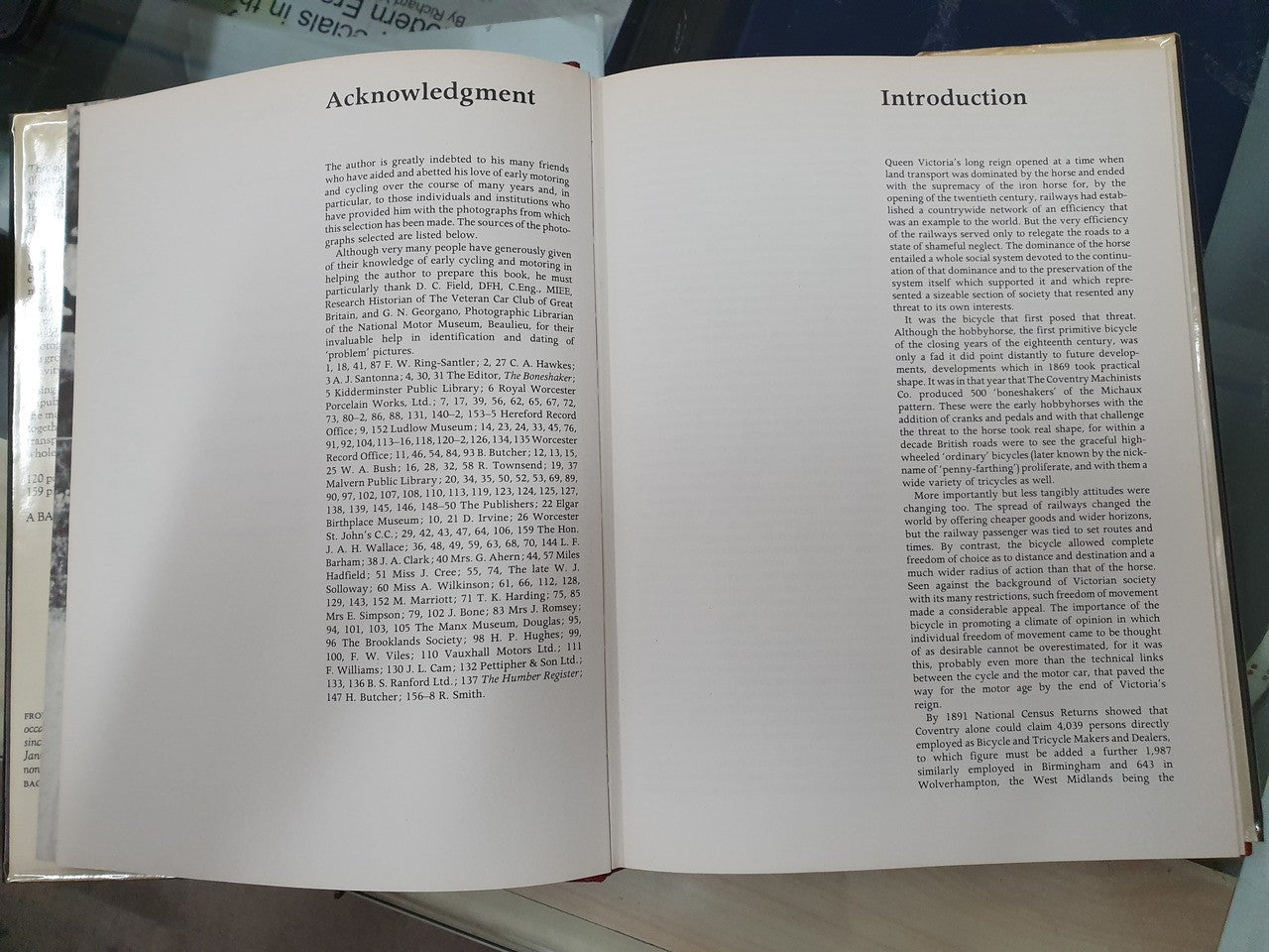 Open book pages with “Acknowledgment” and “Introduction” headings