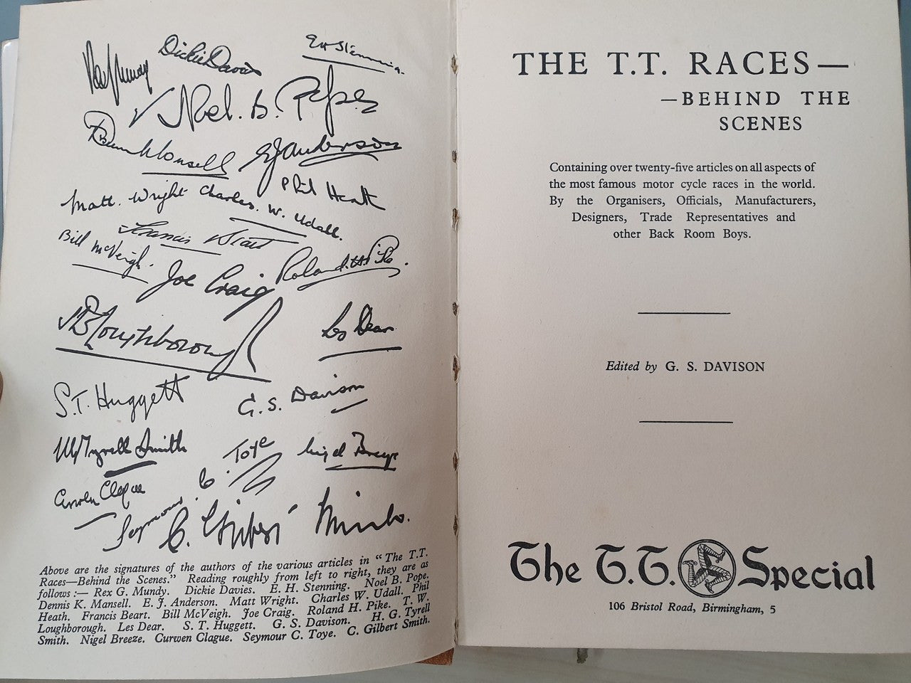Signed book opening with title "The T.T. Races—Behind the Scenes" on the right page