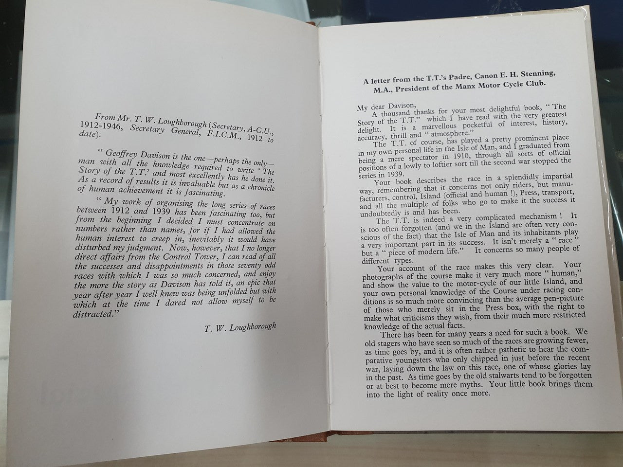 Open book spread with dense text and a signature near the bottom