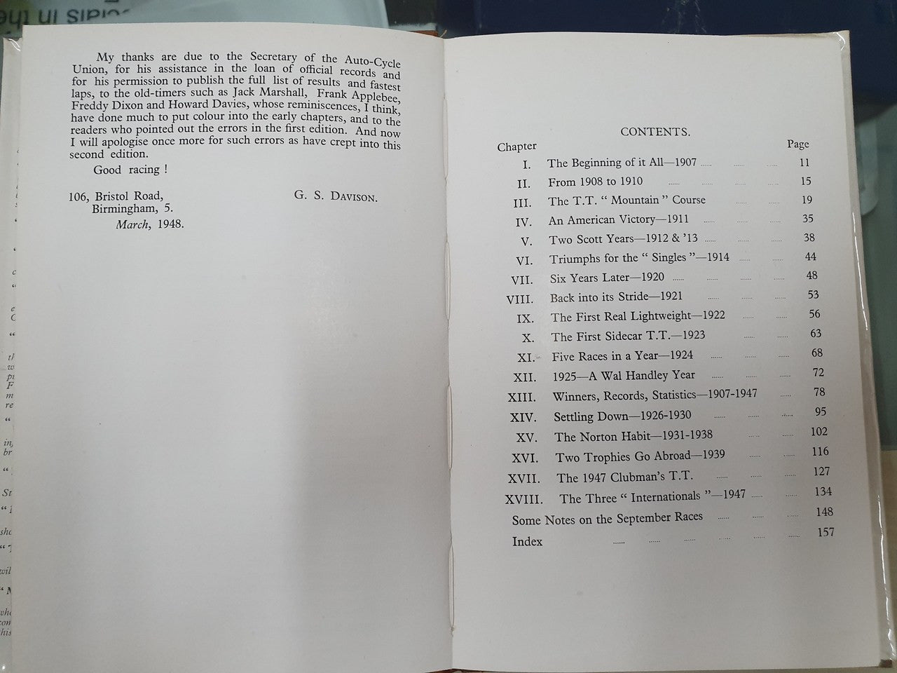 Open book spread showing a table of contents with chapter list and page numbers