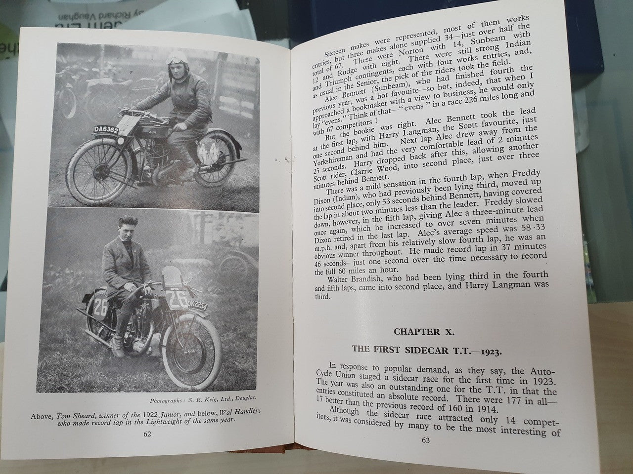 Open book spread with black-and-white photos of a motorcyclist and chapter text