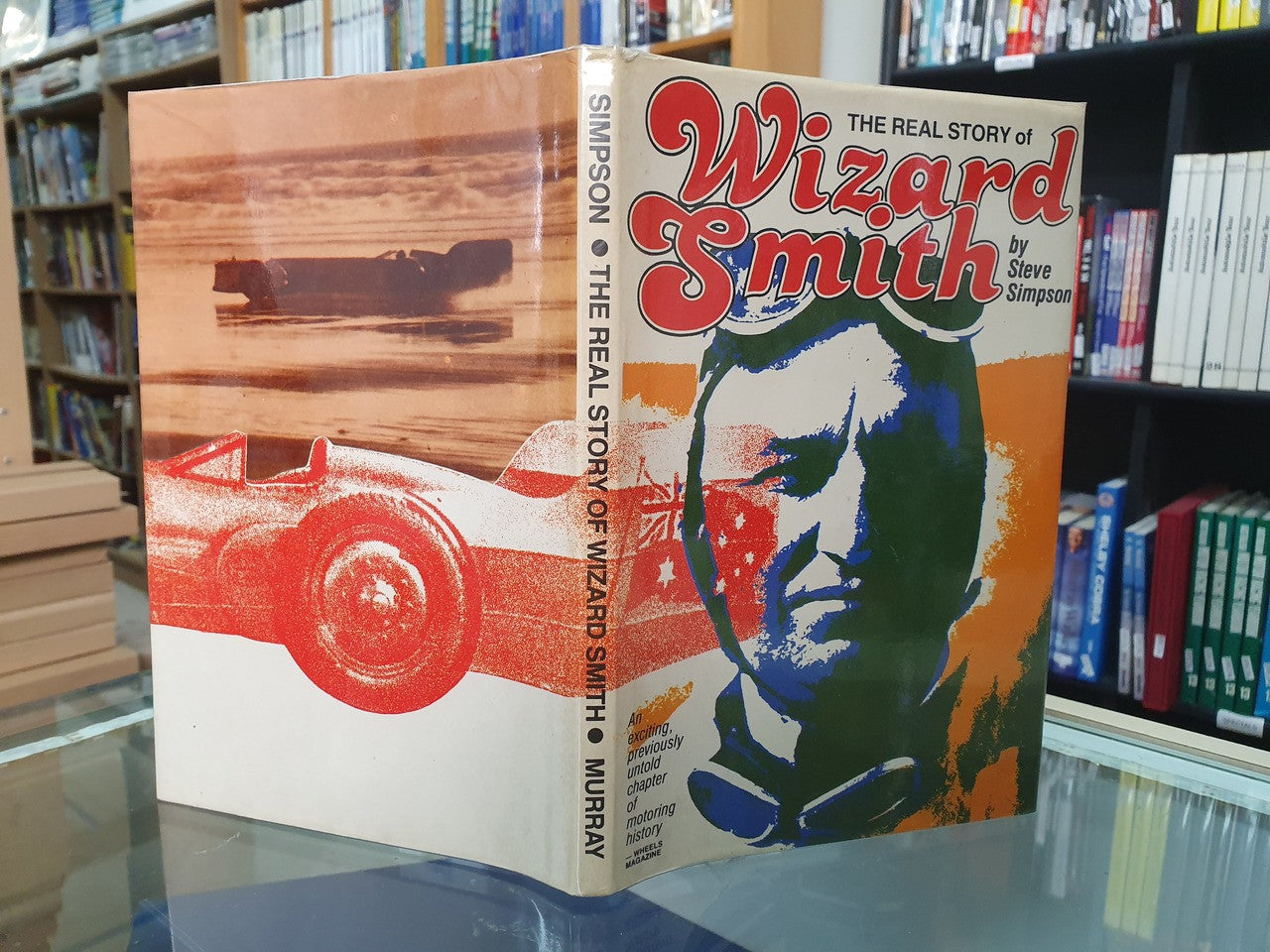 Hardcover book showing front cover artwork with face portrait and title text