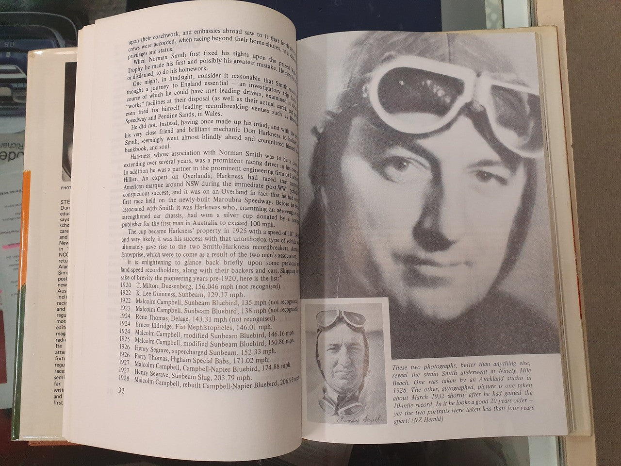 Hardcover book open to text page with a black-and-white portrait photo