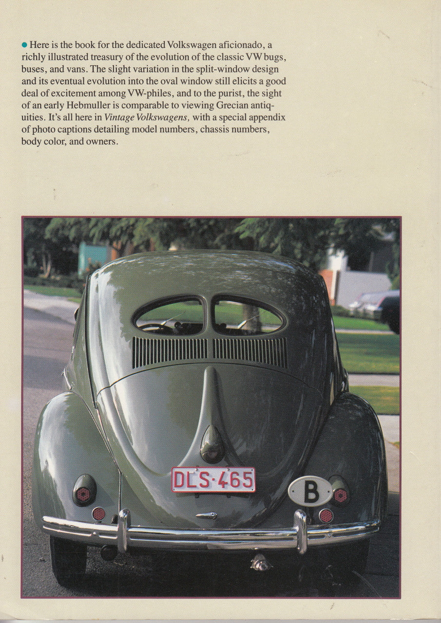 Vintage Volkswagen book page with front view of classic gray Beetle