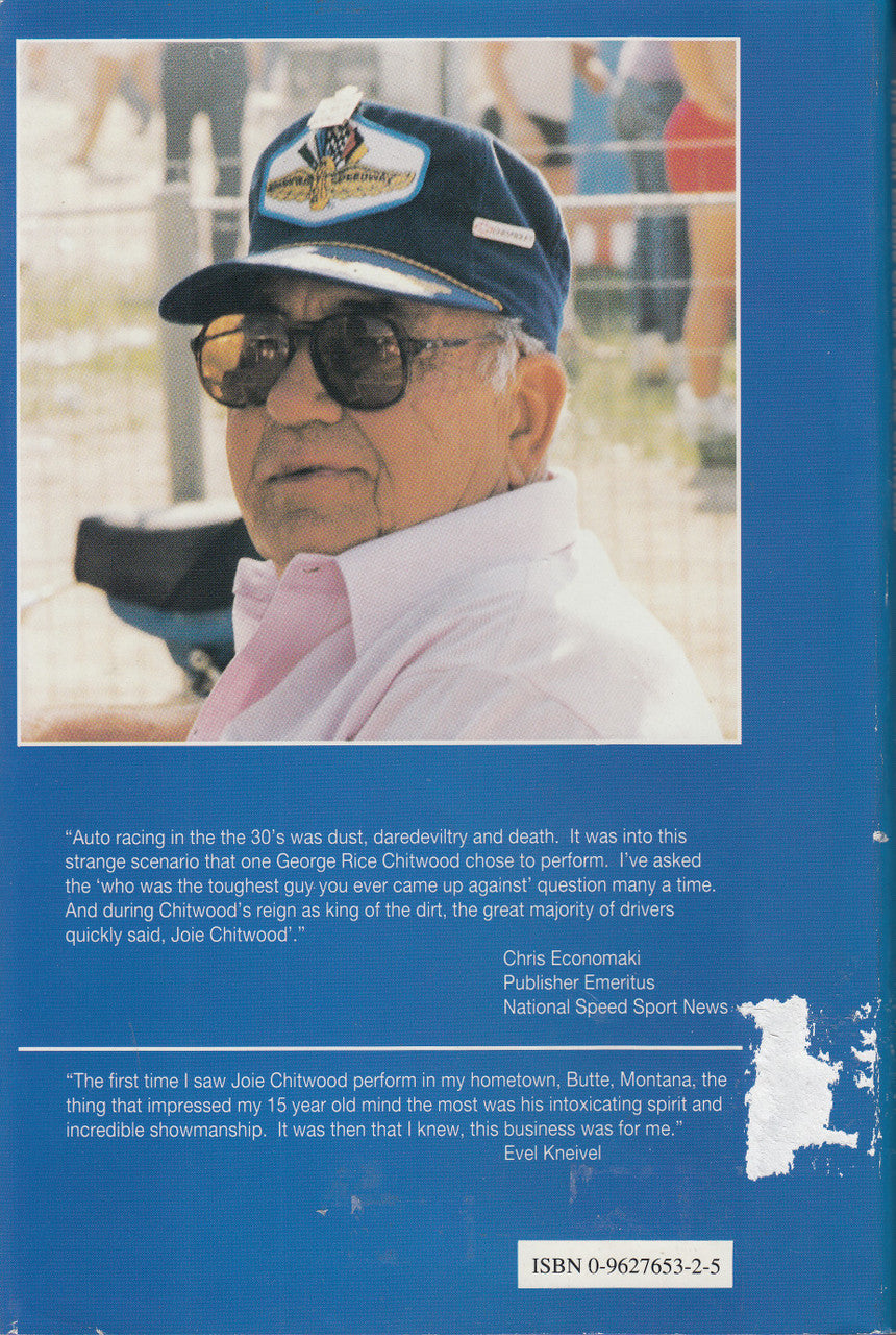 Paperback book back cover with man portrait, glasses, and ISBN at bottom