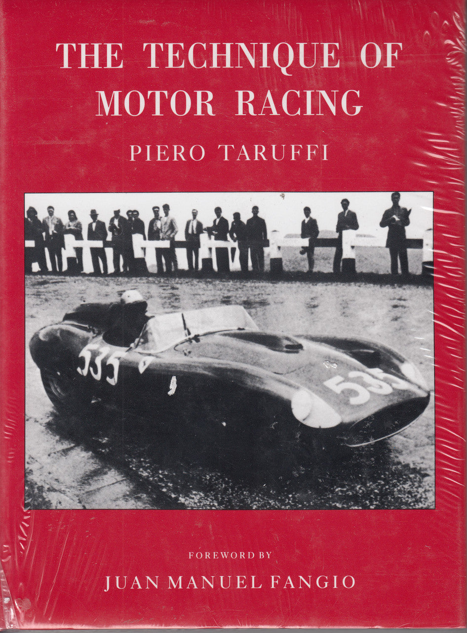 Motor racing technique book with red cover, title and author text, racing car photo