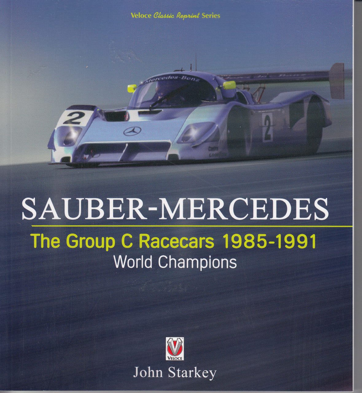 Motorsport history book with blue Mercedes racecar on cover