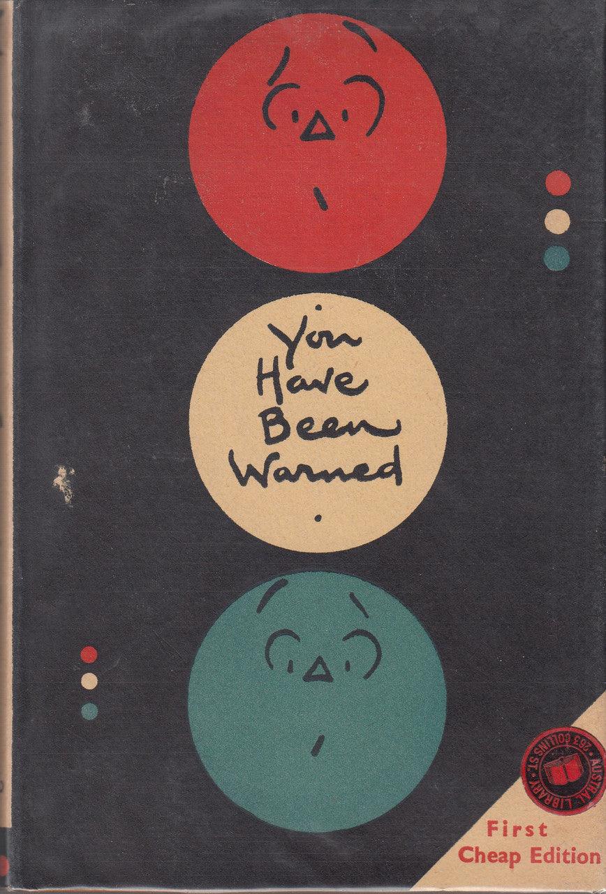 Hardcover book cover with three colored circles and 'You Have Been Warned' text