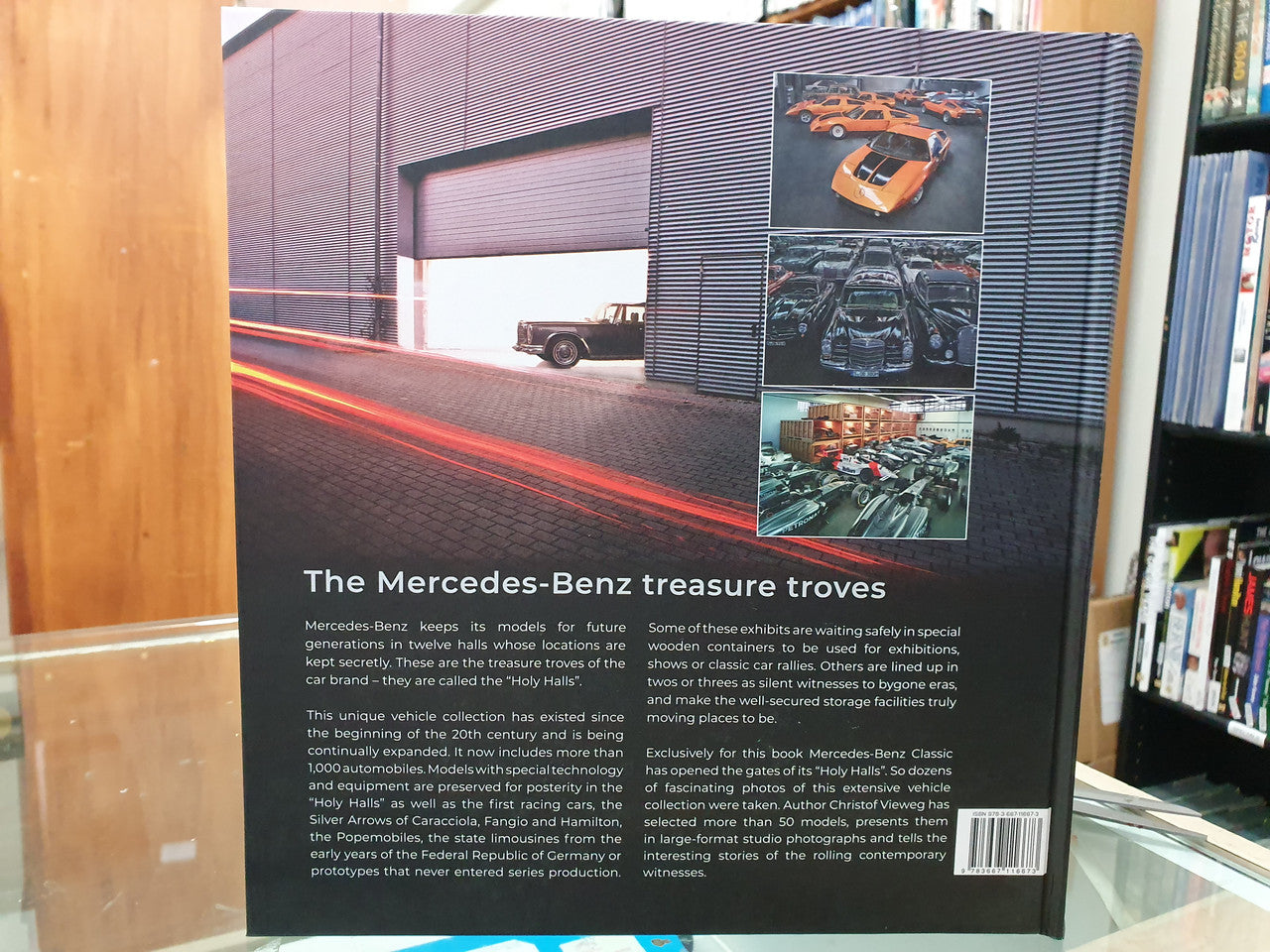 Hardcover car-collection book back cover with Mercedes car collage panel