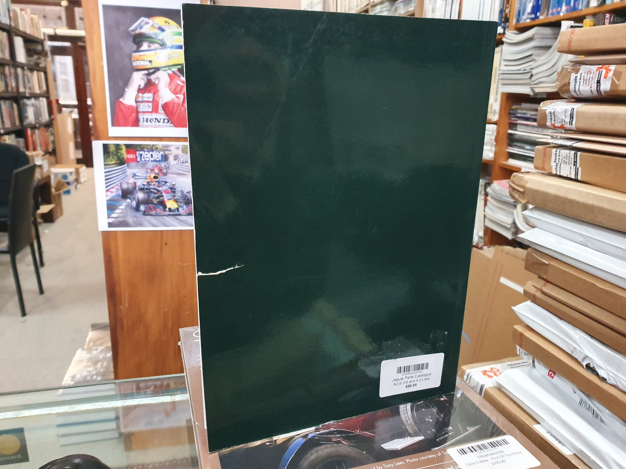 Dark green parts catalogue book with white labels on the front cover