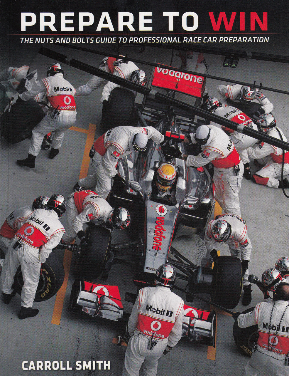 Race car preparation guide book front cover with team photo and red title