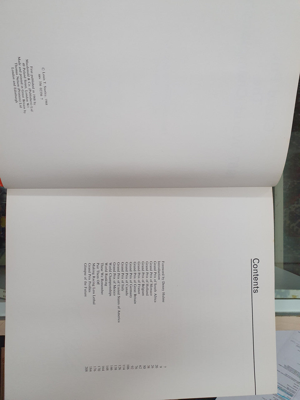 Grand Prix World Championship book interior spread with printed tables and text