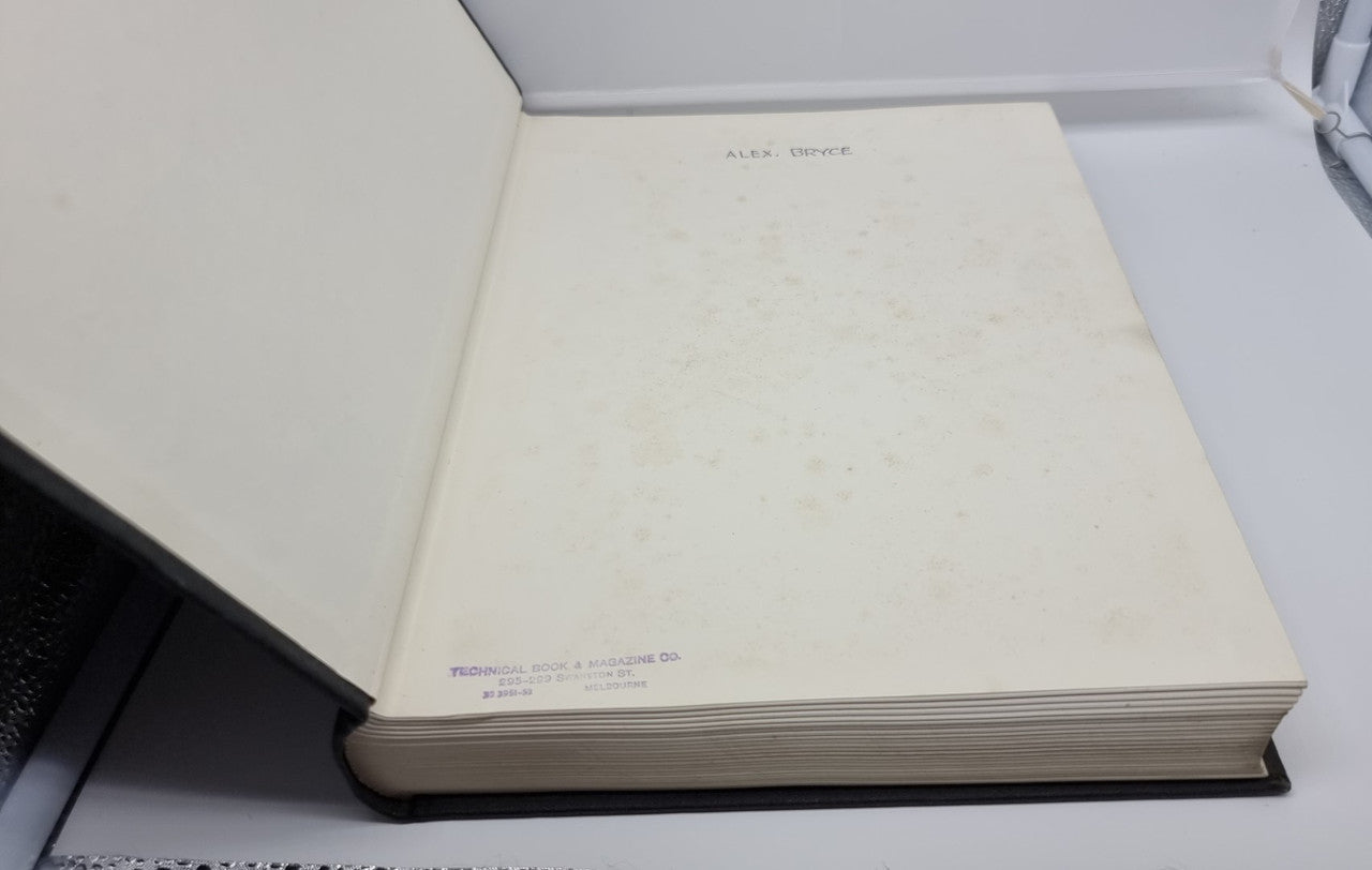Grand Prix motor racing history book, back cover and page edges visible