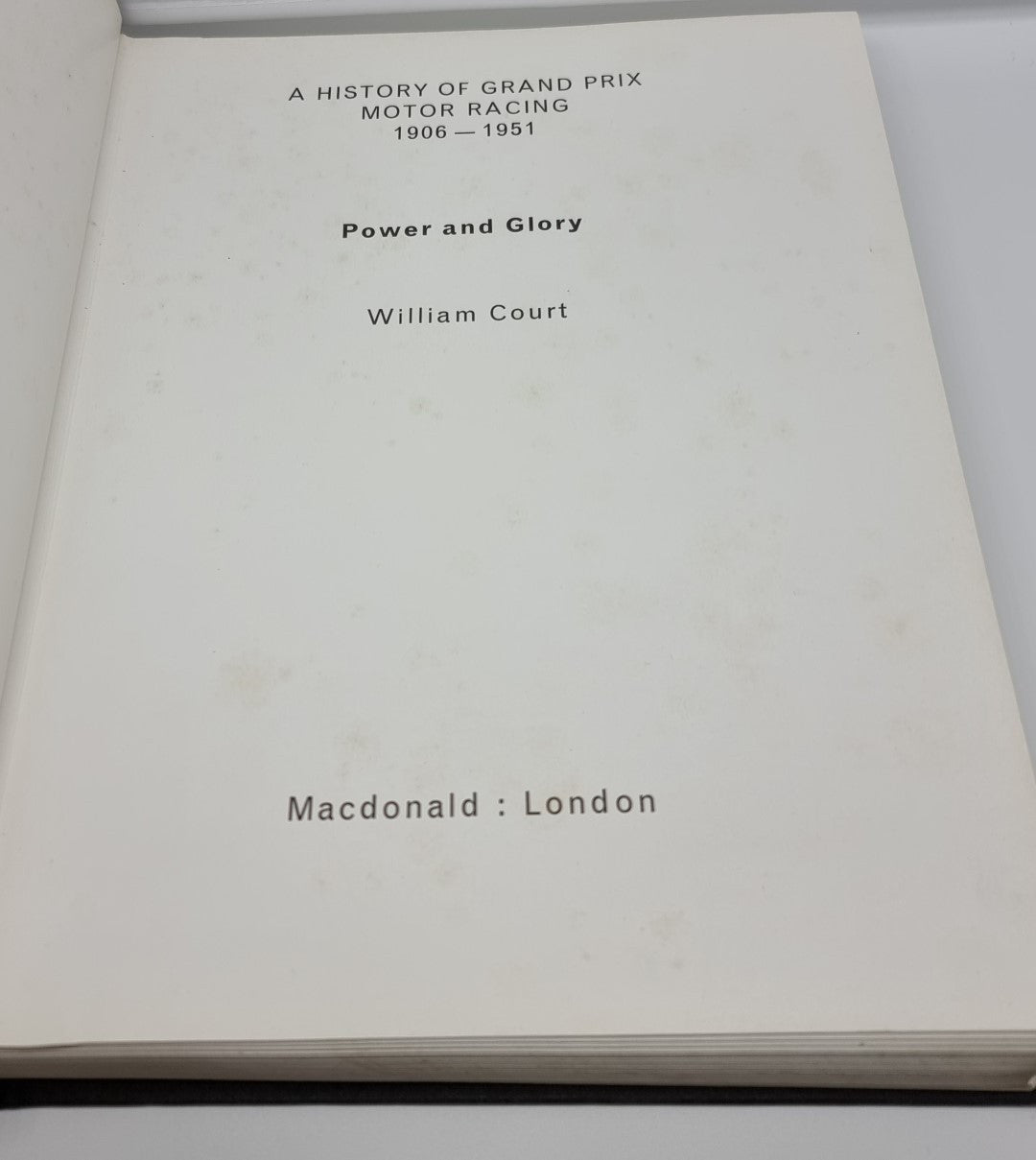 Grand Prix motor racing history book with title and William Court on white cover