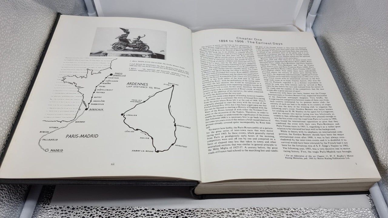 Grand Prix motor racing history book open to page with track map diagram