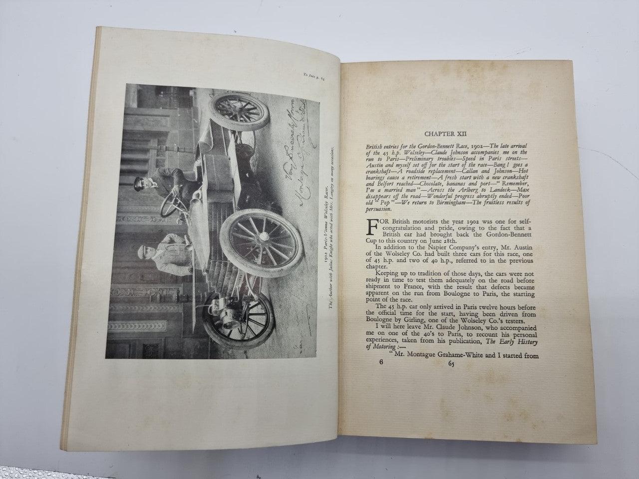 Open book with black-and-white mechanical photo on left and chapter text on right