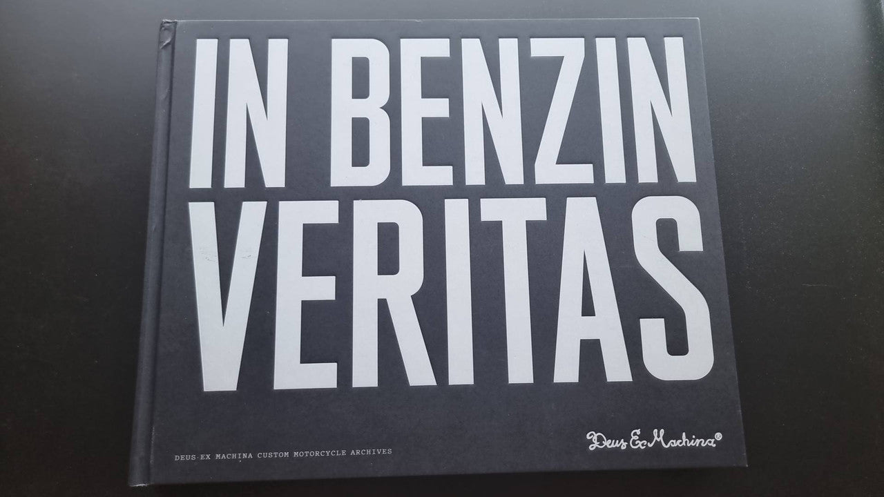 Hardcover book with 'In Benzin Veritas' bold white cover title