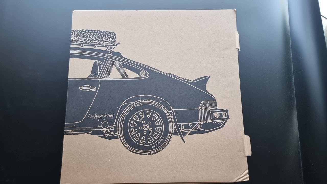 Beige Luftgekuhlt air-cooled Porsche booklet cover with line-art car wheel diagram