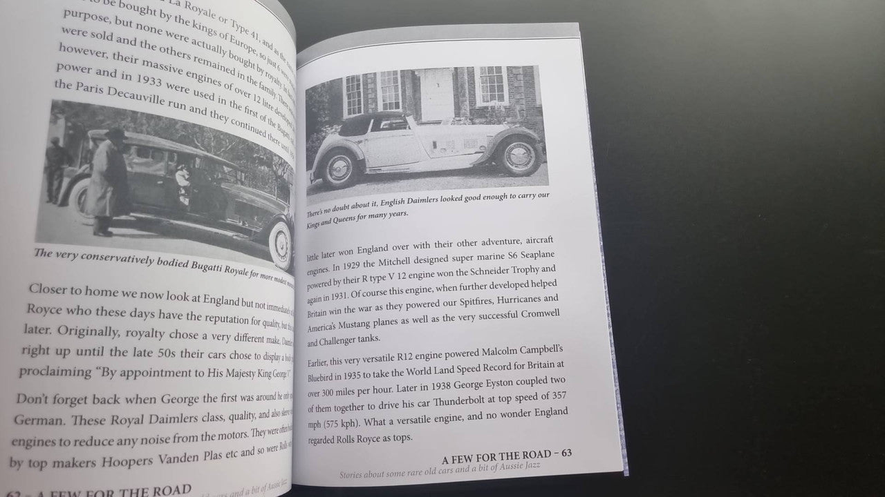 Book spread with vintage black-and-white car scenes and text