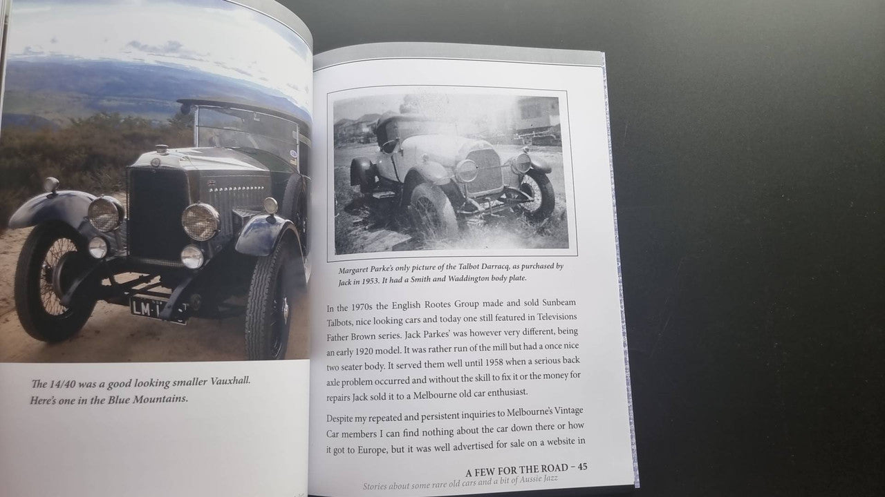 Book spread showing vintage car photographs with text paragraphs