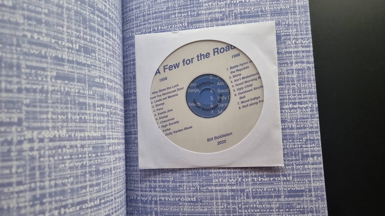 Open book with circular record-style label on page