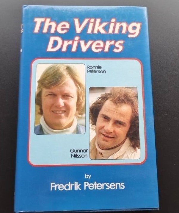 Blue book cover with two driver portrait photos in a red border frame