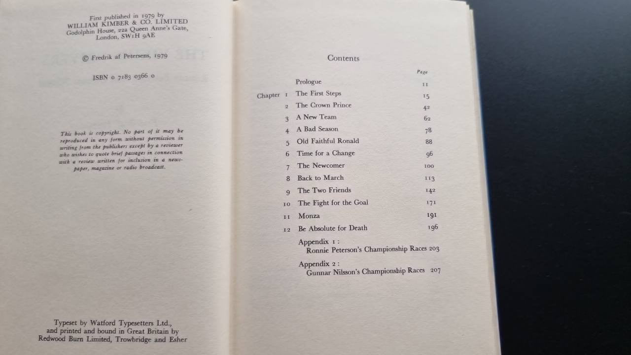 Book open to two pages of printed text and a contents-style list with headings