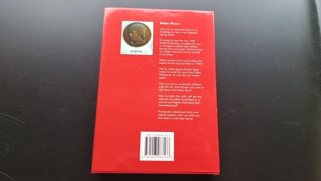 Red hardcover book back cover with portrait text and a barcode near the bottom