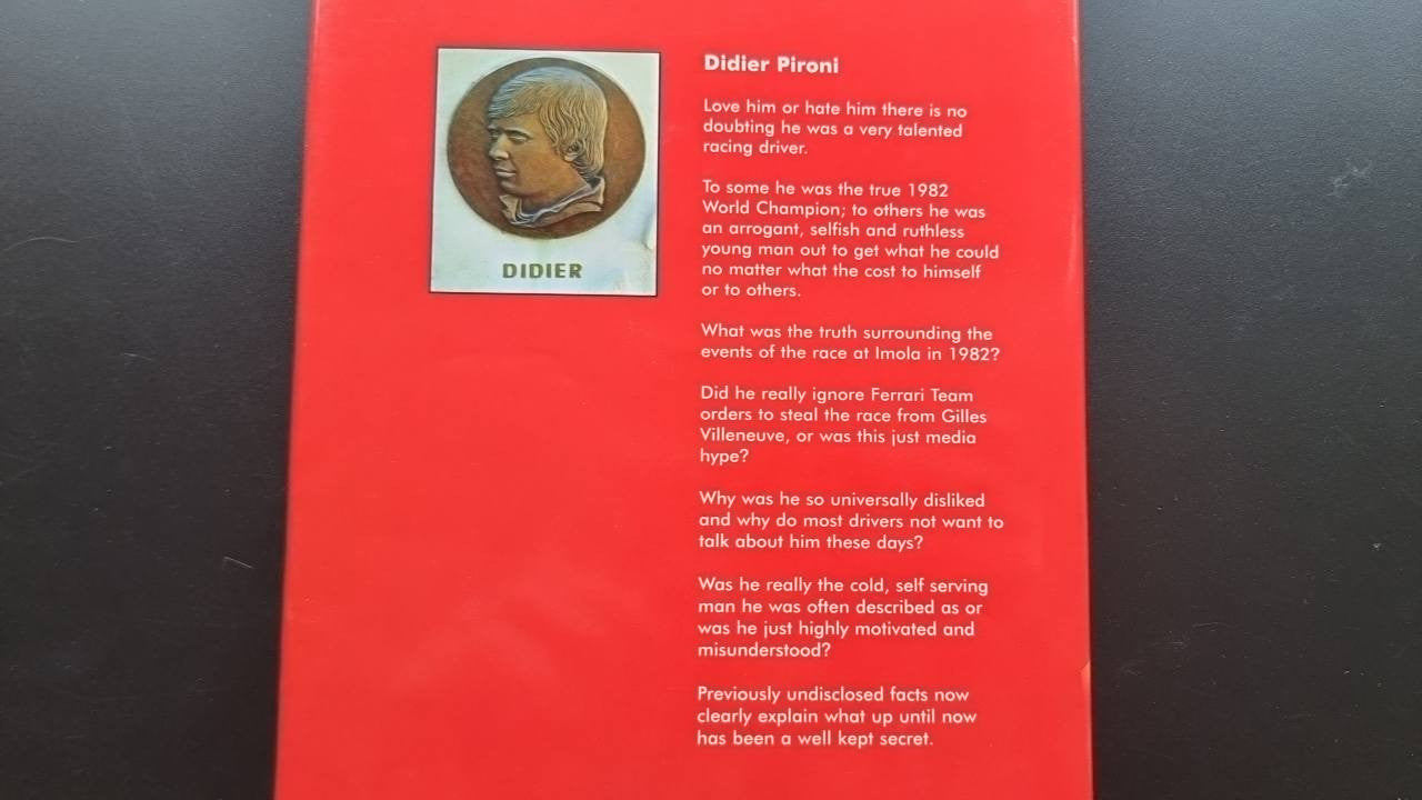 Book back page with small portrait box and dense paragraphs in red and white.
