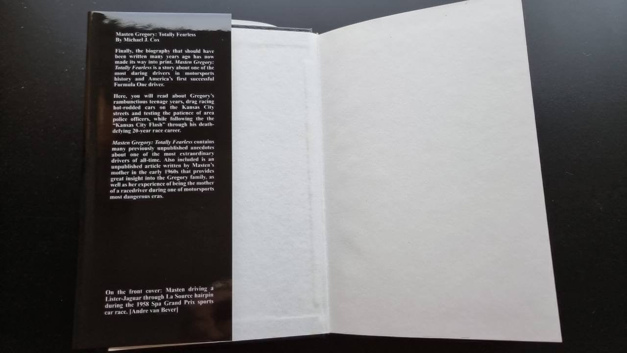Open paperback book showing printed page text on the right and left pages