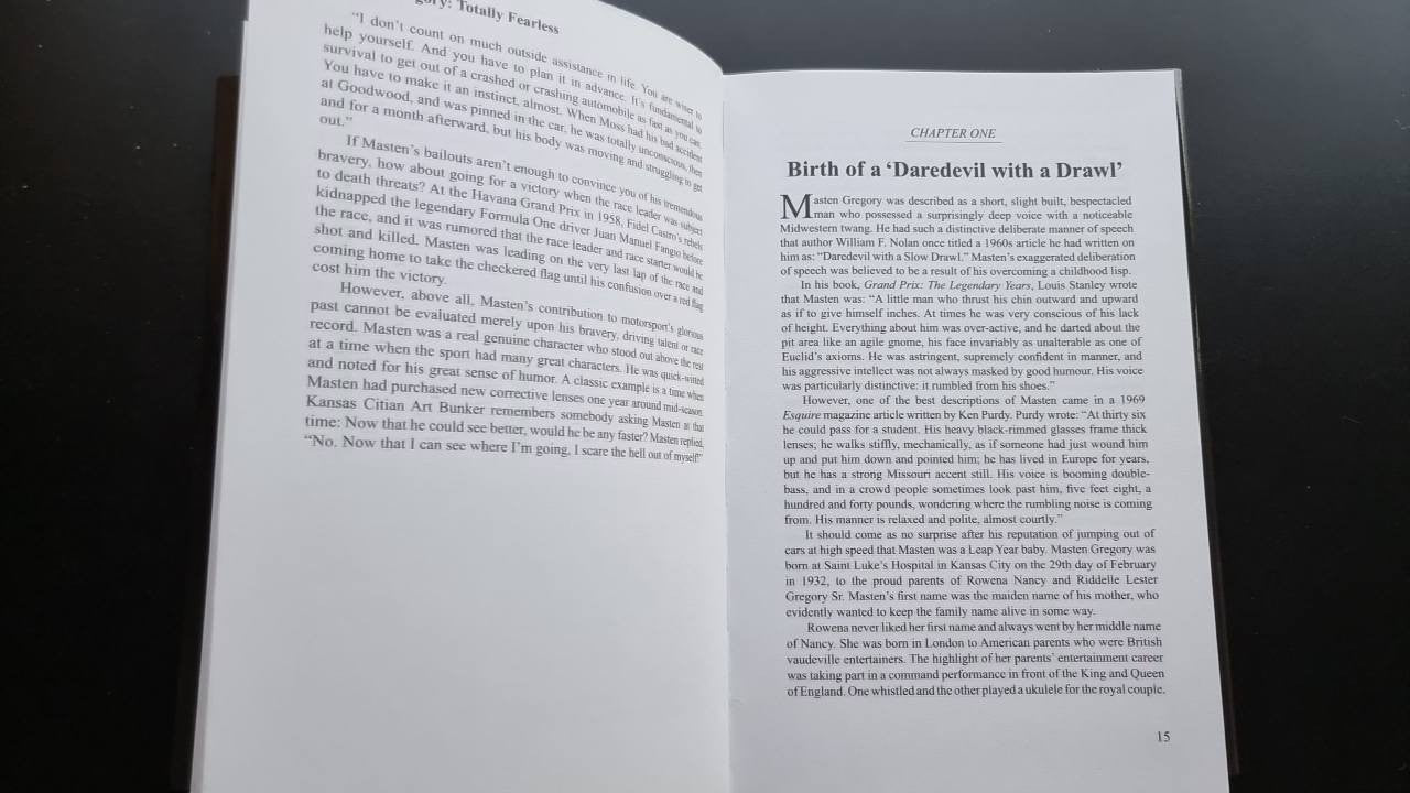 Open book page spread with chapter titles and dense text columns