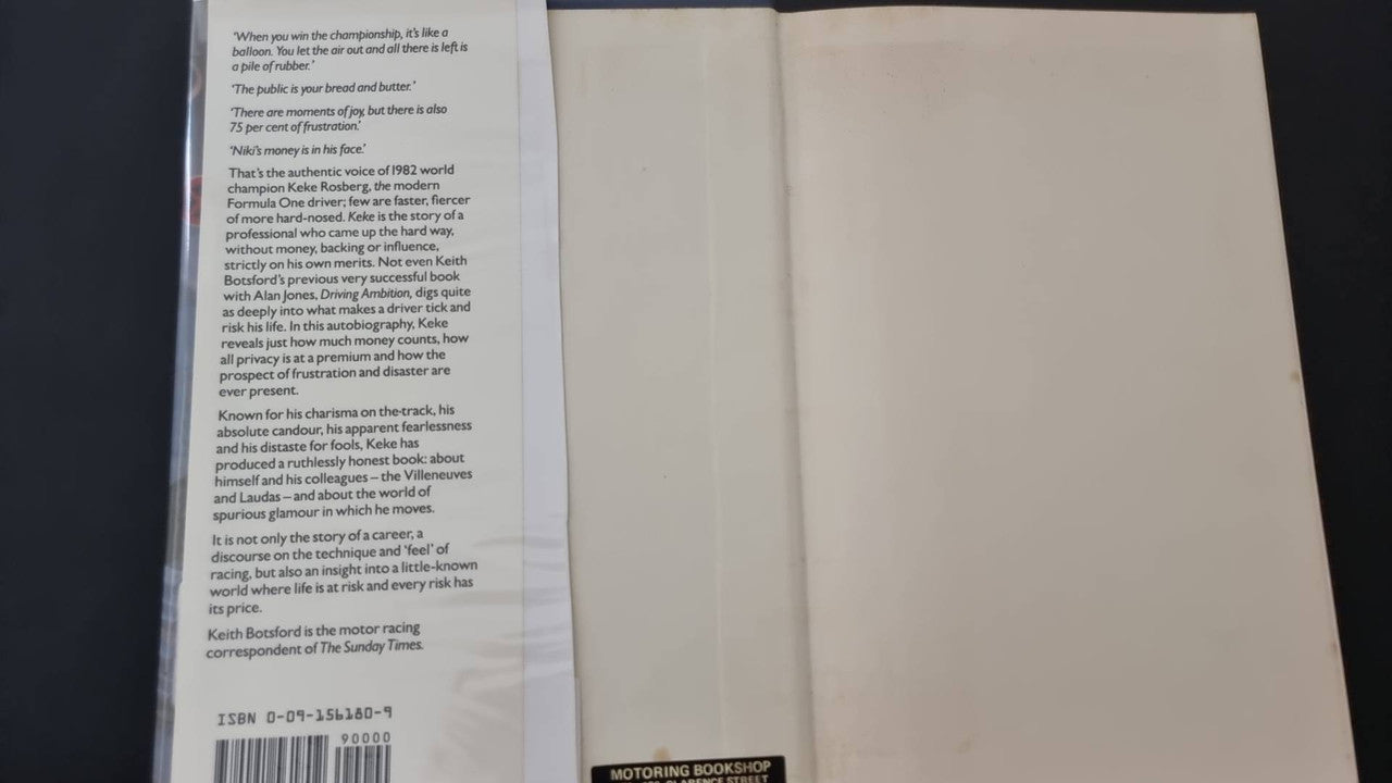 Open book with printed text on left page and blank right page