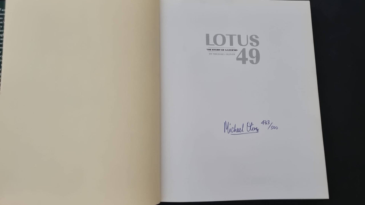 Signed Lotus 49 book with Michael Oliver signature on light cover