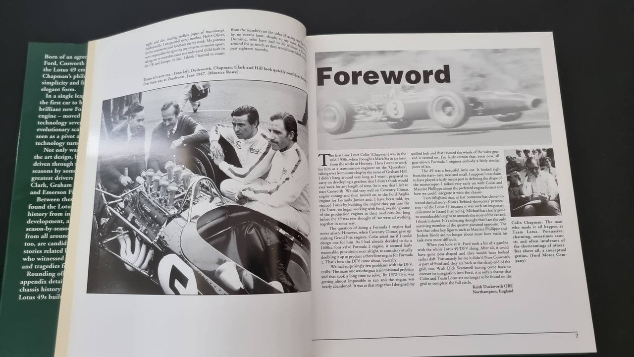 Opened Lotus 49 book foreword page with 'Foreword' heading and black-and-white photos
