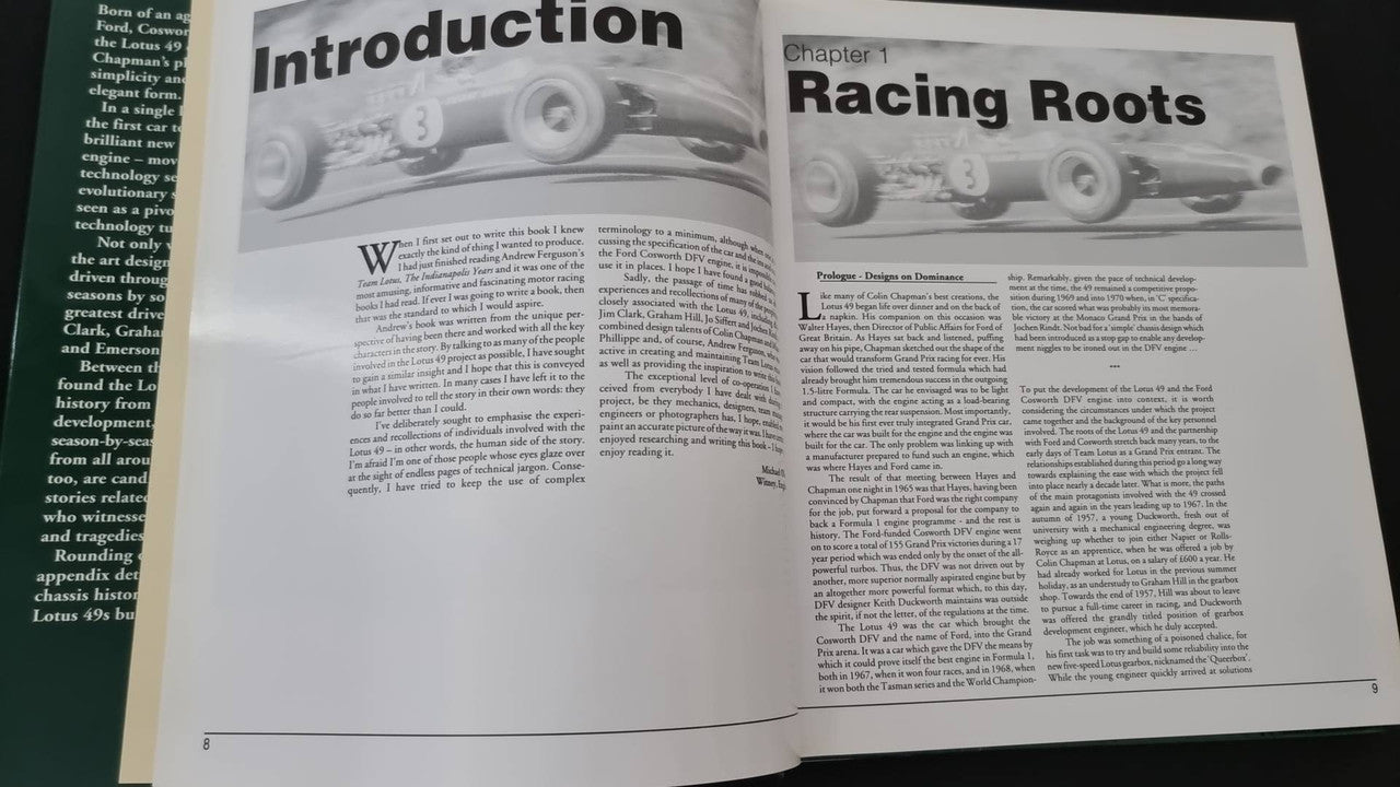 Open motorsport history book with "Introduction" and chapter title "Racing Roots"