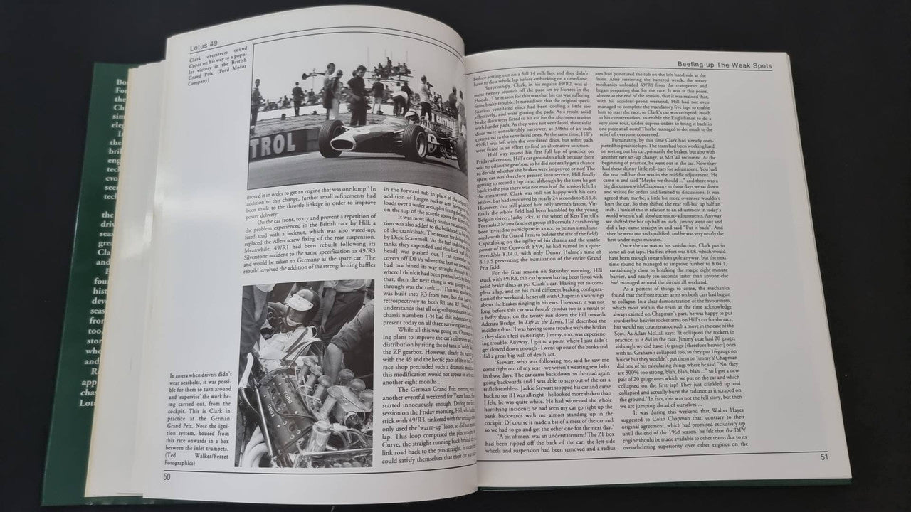Open motorsport history book with dense text and black-and-white race photos