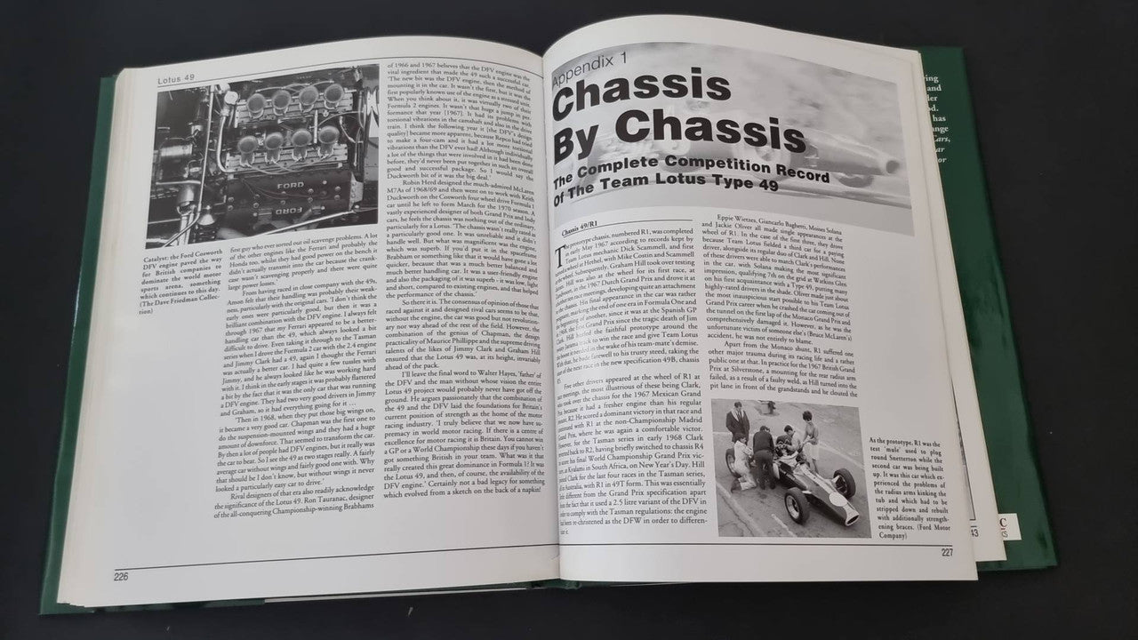 Open motorsport history book with heading "Chassis" and small race photos