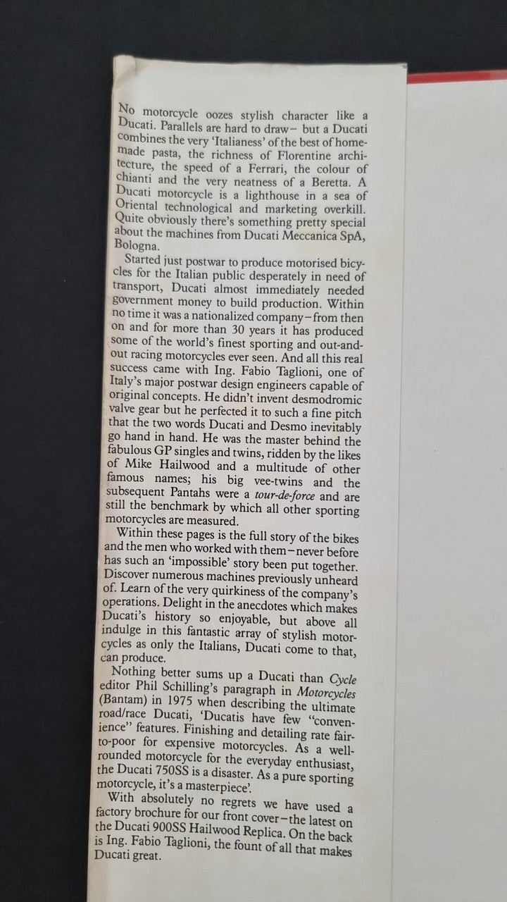 Motorcycle book page with dense paragraphs and highlighted lines