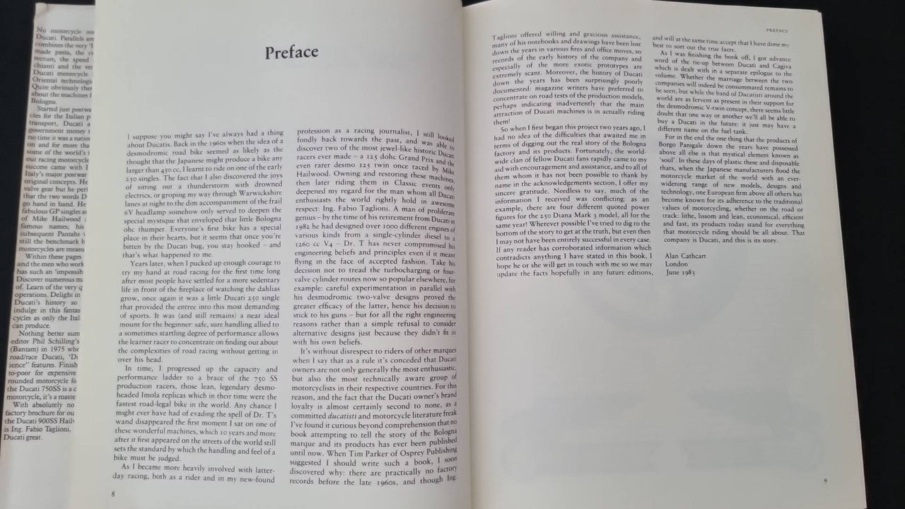 Motorcycle book open on Preface pages with dense printed text