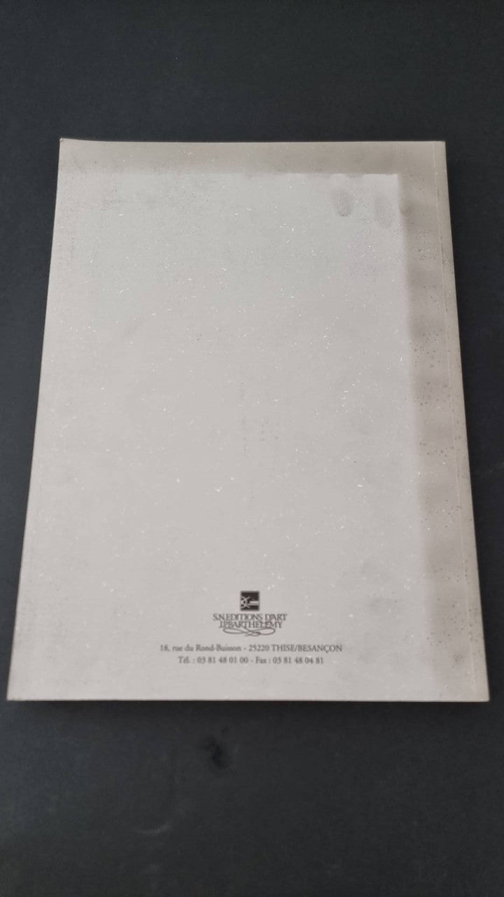 Book back cover with centered text block, logo, and barcode label