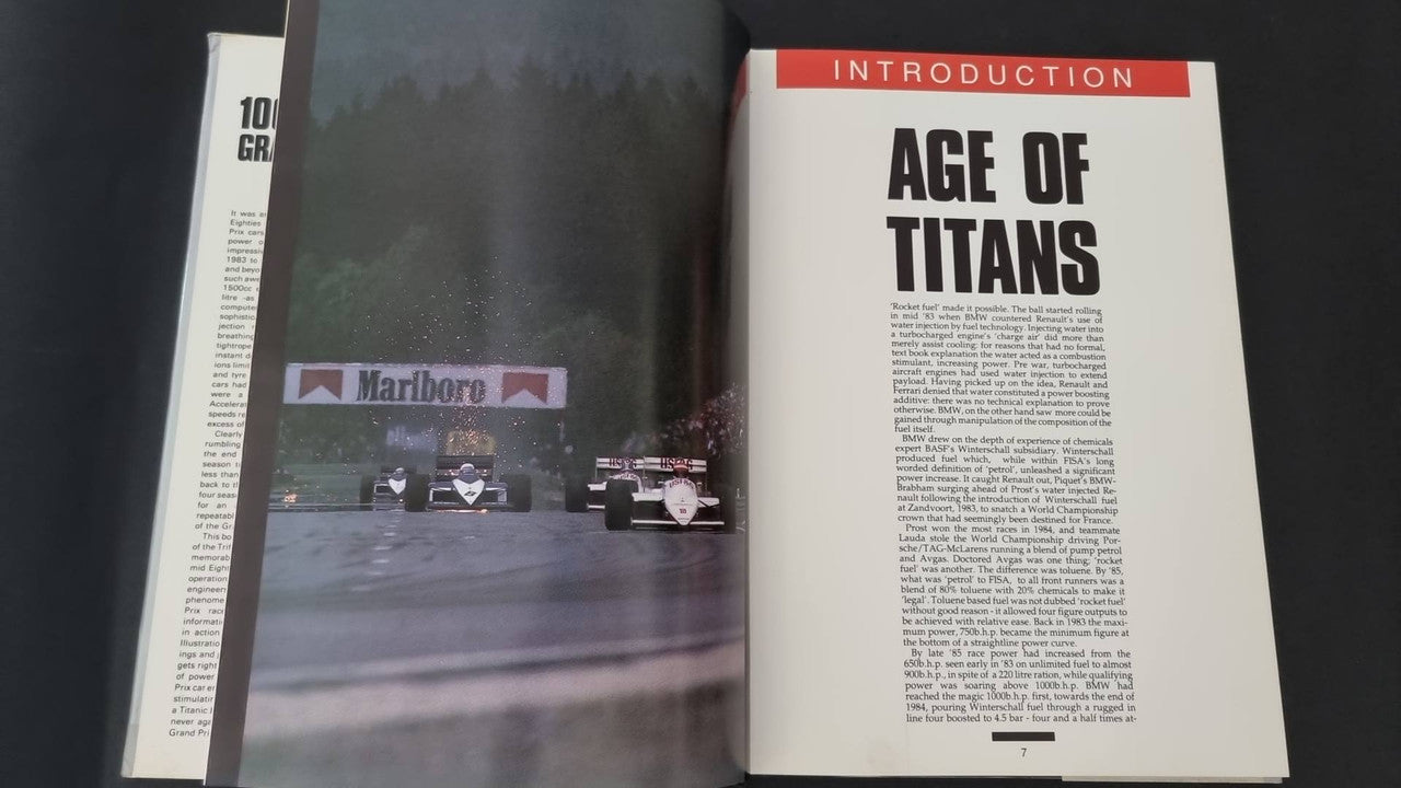 Open book spread with black-and-white track photo on the left and 'Introduction' text