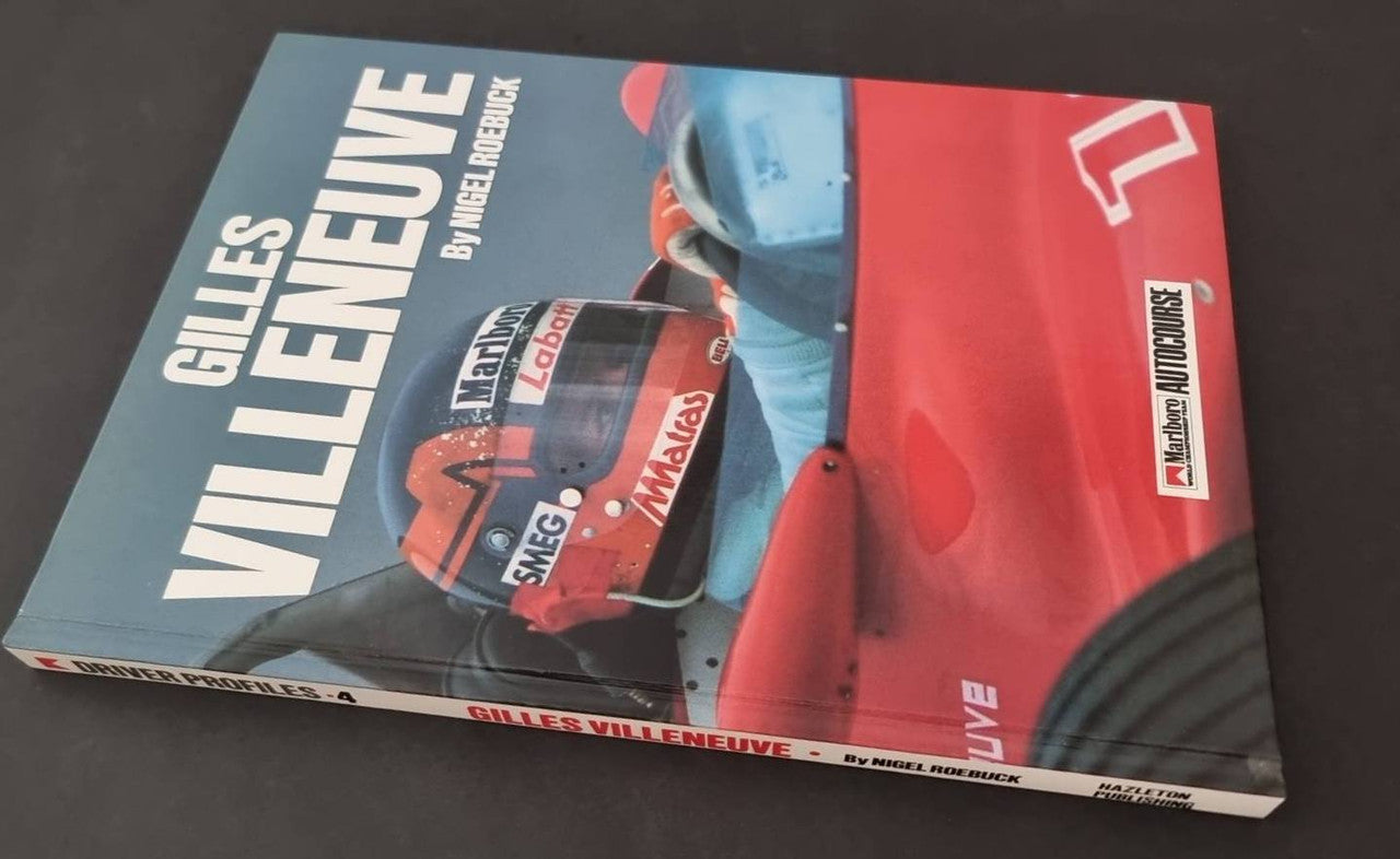 Gilles Villeneuve racing book, front cover with blue title text and helmet photo