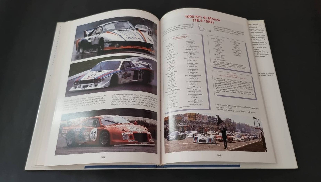 Open motorsport book with car close-ups and a right-side race statistics panel